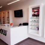 Shelving stocked with the NOW Foods vitamins and supplements range
